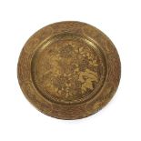 A pair of Japanese brass plates, decorated with birds and foliage within Greek key surround, 24.