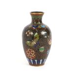 A small oriental cloisonne baluster vase, decorated with symbols, flowers and butterflies, 9cm high