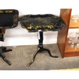 A 19th Century ebonised tripod table, the top formed from a papier mache tray, AF