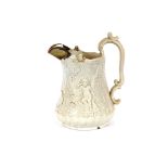 A large Victorian white glazed relief moulded jug, having silvered lip, scroll handle and cherub