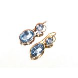 A pair of yellow metal and blue stone drop ear-rings