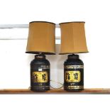 A pair of 19th Century japanned metal tea canisters, converted to table lamps