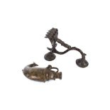 An unusual Middle Eastern 19th Century bronze flask, in the form of a fish and an unusual bronze