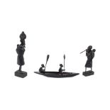 Two Ethnic carved ebony figures, depicting native women and an Ethnic group of figures in a boat