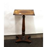 A 19th Century rosewood plant stand, raised on baluster turned supports and tripod base