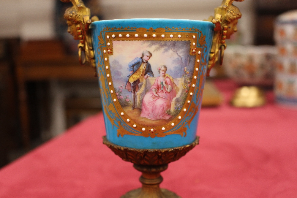 A pair of 19th Century Sevres style gilt metal mounted urns and covers, surmounted by foliate and - Image 8 of 19