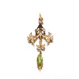 A small 19th Century yellow metal pendant, set with diamonds and peridot drop