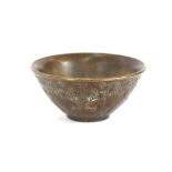 A small Chinese bronze bowl, with animal and figural decoration, 6cm dia.