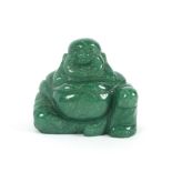 A small Jade figure of a seated Buddha