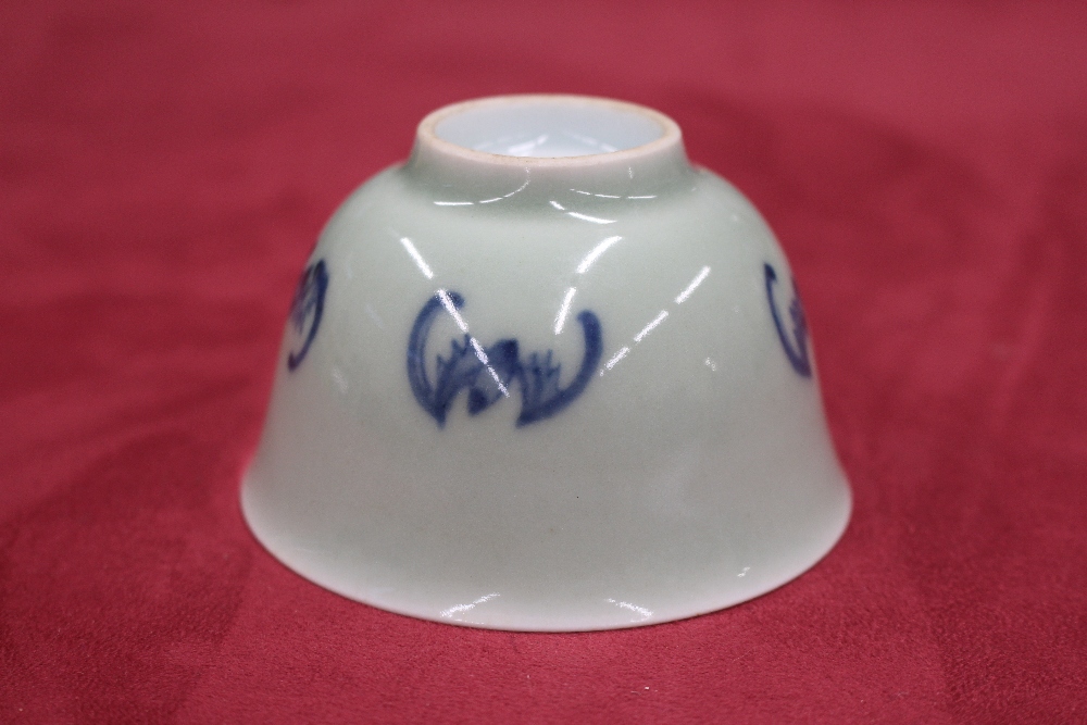 A small oriental celadon ground bowl, decorated with bats, character mark to base, 9cm dia. - Image 5 of 7