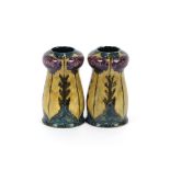 A pair of Morris ware by S. Hancock & Sons vases, having thistle decoration, 16cm high