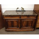 A 19th Century rosewood side cabinet, with marble top, two drawers and cupboards under, raised on