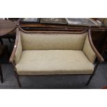 A small Edwardian walnut salon settee, with beaded and leaf carved decoration, 110cm wide