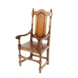 A set of eight  Carolean style oak high back dining chairs, having arched cresting rails above