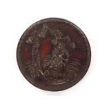 A Japanese bronze plaque, depicting a figure on horseback, 39.5cm dia.