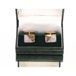 A pair of yellow and white metal diamond set cuff-links, stamped 9k