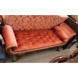 An early 19th Century walnut and brass mounted scroll end day bed, upholstered in pink dralon,