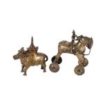 A 19th Century Indian bronze pot and cover, in the form of a Nandi bull; and a 19th Century Indian