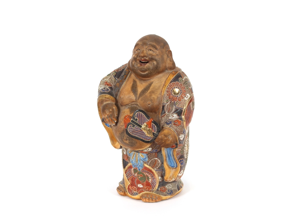 A glazed earthenware figure of Hotei, 28cm high