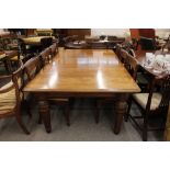 A Victorian mahogany extending dining table, raised on octagonal tapering supports, 121cm x 203cm