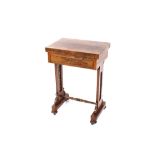A 19th Century rosewood fold-over games table, the swivel top above single drawer, raised on pierced