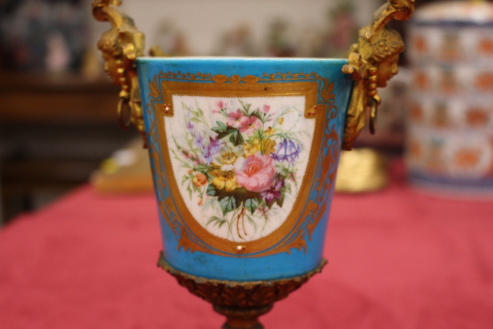 A pair of 19th Century Sevres style gilt metal mounted urns and covers, surmounted by foliate and - Image 17 of 19