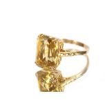 A large citrine 9 carat gold mounted ring; and a diamond set gold mounted ring, (2)