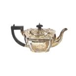 A silver teapot, with blackwood handle and lift; and a matching hot water jug, Birmingham 1836/37,