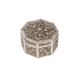 A 19th Century Chinese silver octagonal box, profusely decorated with dragons, seal marks to base,