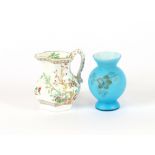 A 19th Century Chinese rose pattern baluster jug; and a blue satin glass baluster vase with floral