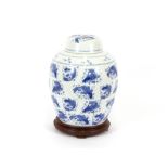 A large Chinese blue and white ginger jar and cover, decorated with carp, 38cm high, (cover AF)