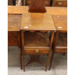 A 19th Century mahogany two tier night stand, shaped frieze, single drawer, raised on square