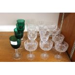 Six star cut Port glasses, various others and four green tinted glasses with faceted stems, (16)