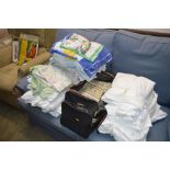 A quantity of various materials; towels etc