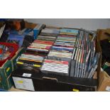 A box of various CD's