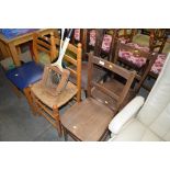 A pair of elm seated bar back chairs