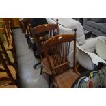A pair of bentwood stick back chairs