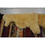 An approx 2'10" x 2'6" sheepskin