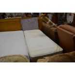 A single divan bed and mattress