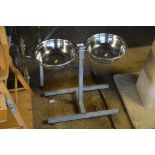 Two dog bowls on stand