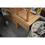 A beech effect drop leaf table