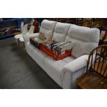 A Parker Knoll three seater settee