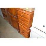A pair of modern bedside chests fitted three draws