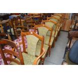 A set of six Ducal pine chairs to include two carv