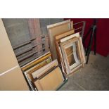 A box and a quantity of various picture frames