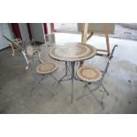 A mosaic topped bistro set