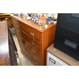 A mahogany effect chest fitted five long drawers