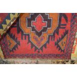 An approx. 4'9" x 2'8" Bolochi rug