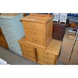 Three matching three drawer oak bedside chests