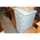 A green painted pine chest of narrow proportions f